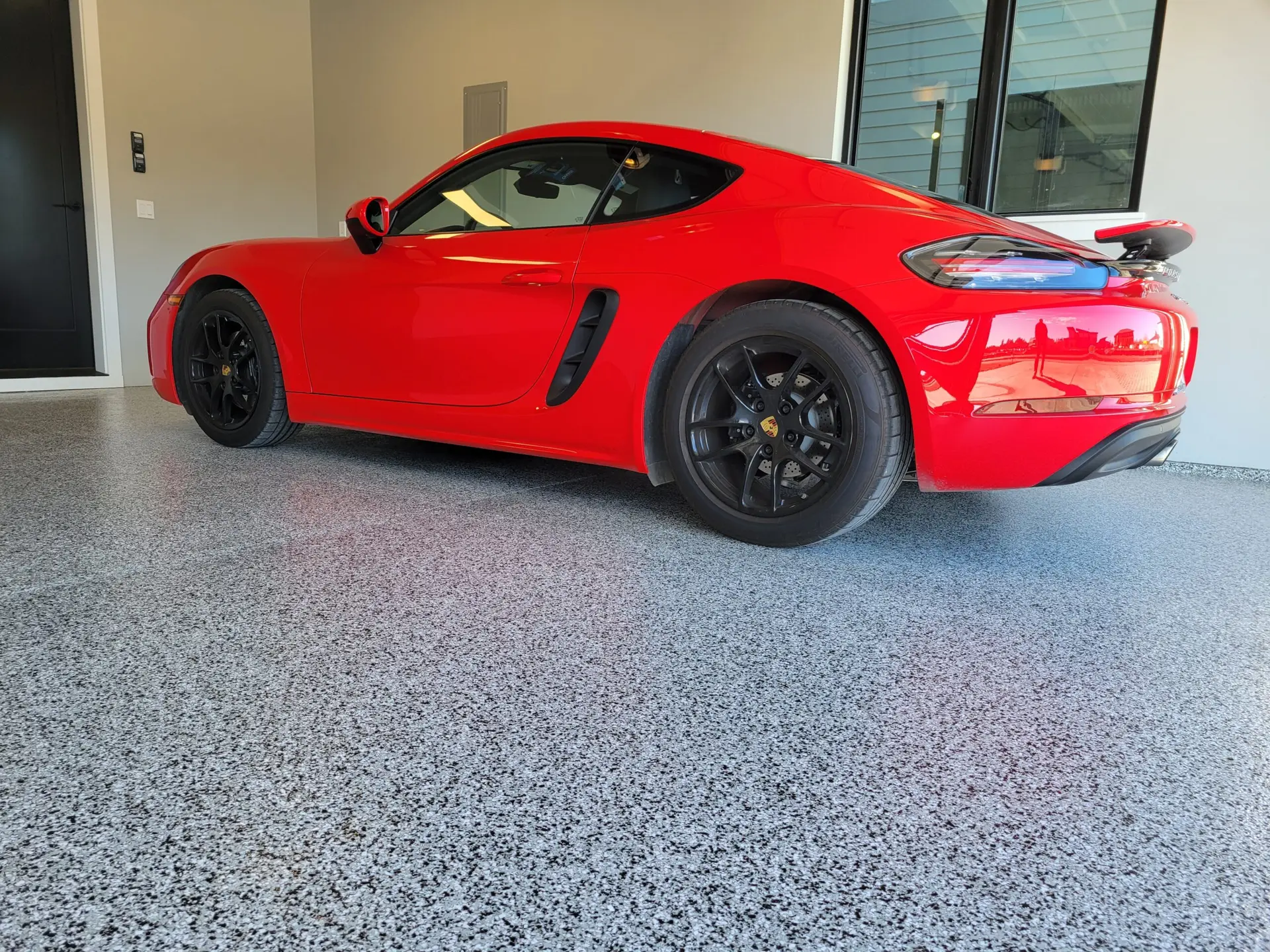 red-porsche-side